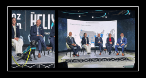 CEOs of the Aid Societies sitting in a row on a stage. 